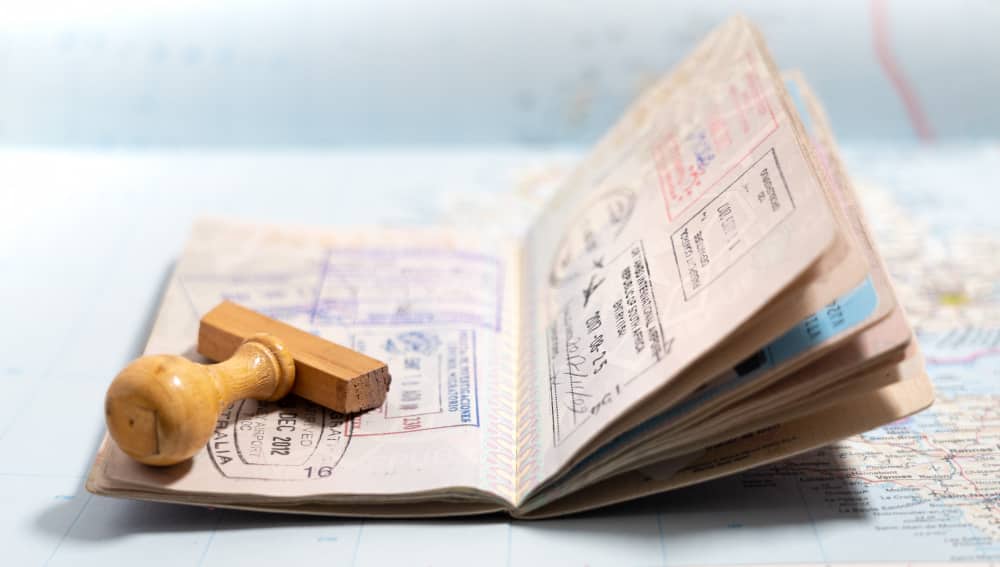 passport pages with lot visa stamps min - Business Immigration from Turkey to Canada in Immigration Law