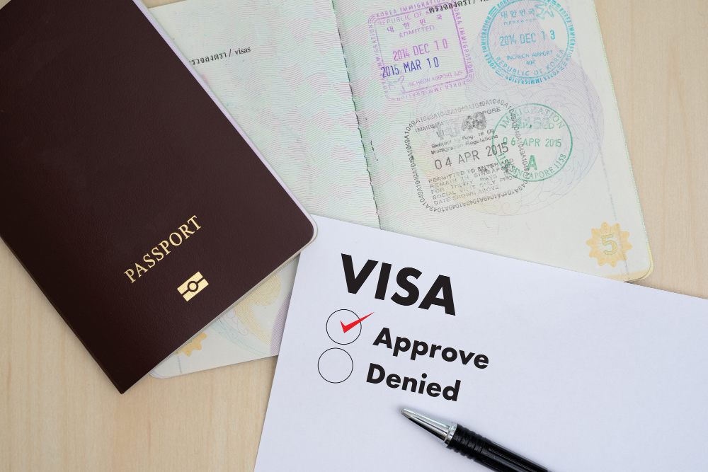 Passport and approved visa for Canada work visa for Italian
