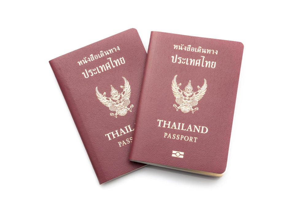 Two thailand passport of immigrants who have Immigrated to Thailand