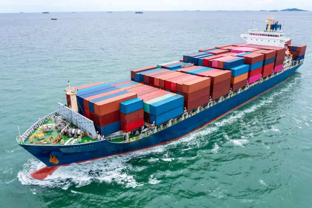 A ship full of goods being traded internationally after complusory insurance