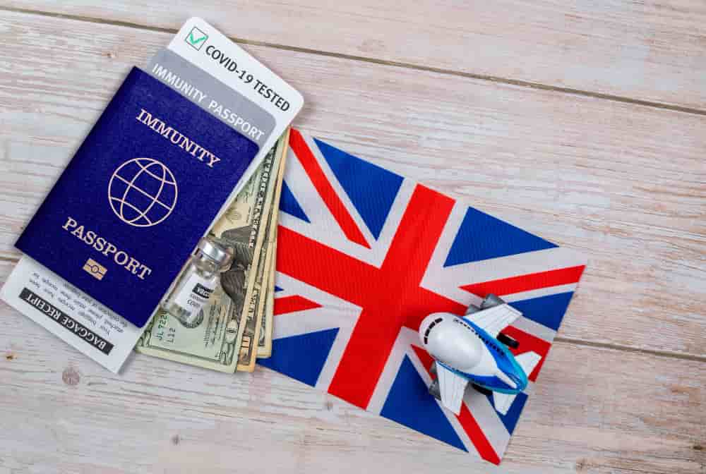 A passport and money of an immgrate who is ready to mmigrate from Brazil to the UK