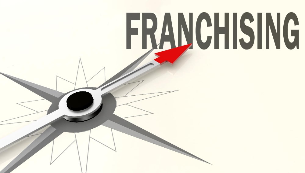 A meter pointing in the direction of franchising
