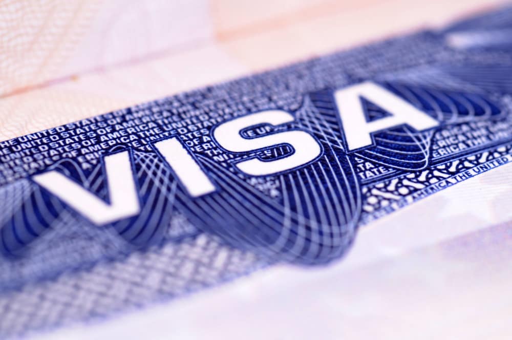 A visa stamp on a approved visa application