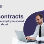 An employee researching contracts that an employee should know about