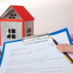 A lawyer finalizing the Lease vs Rent for a house owner