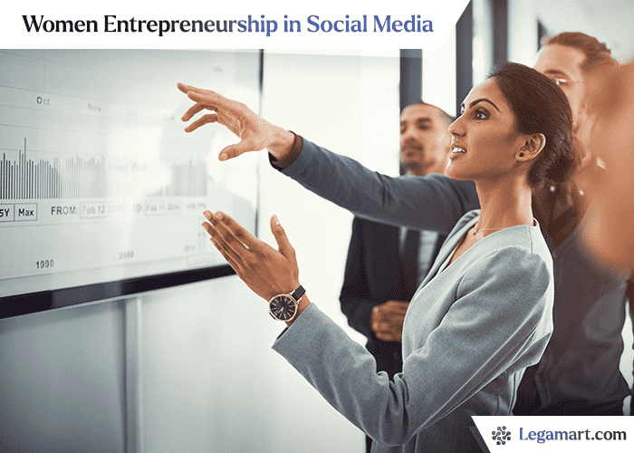 A woman entrepreneur reviewing her business statistics and how it supports women Entrepreneurship in Social Media